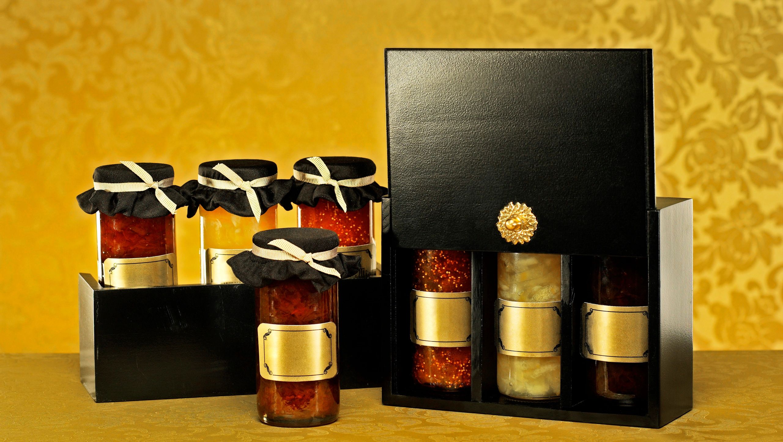 Elegant jam jars arranged for a product shoot
