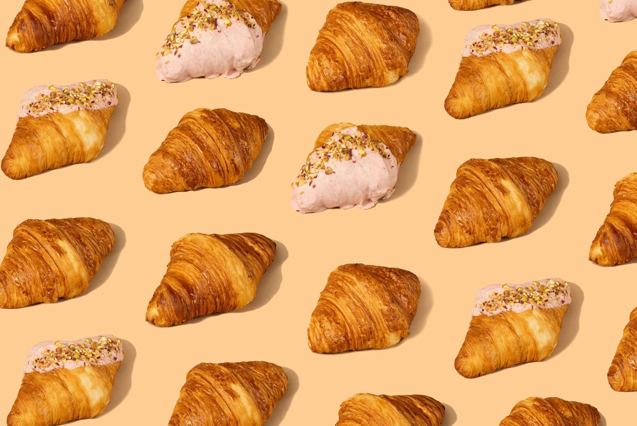 Croissant on pastel background