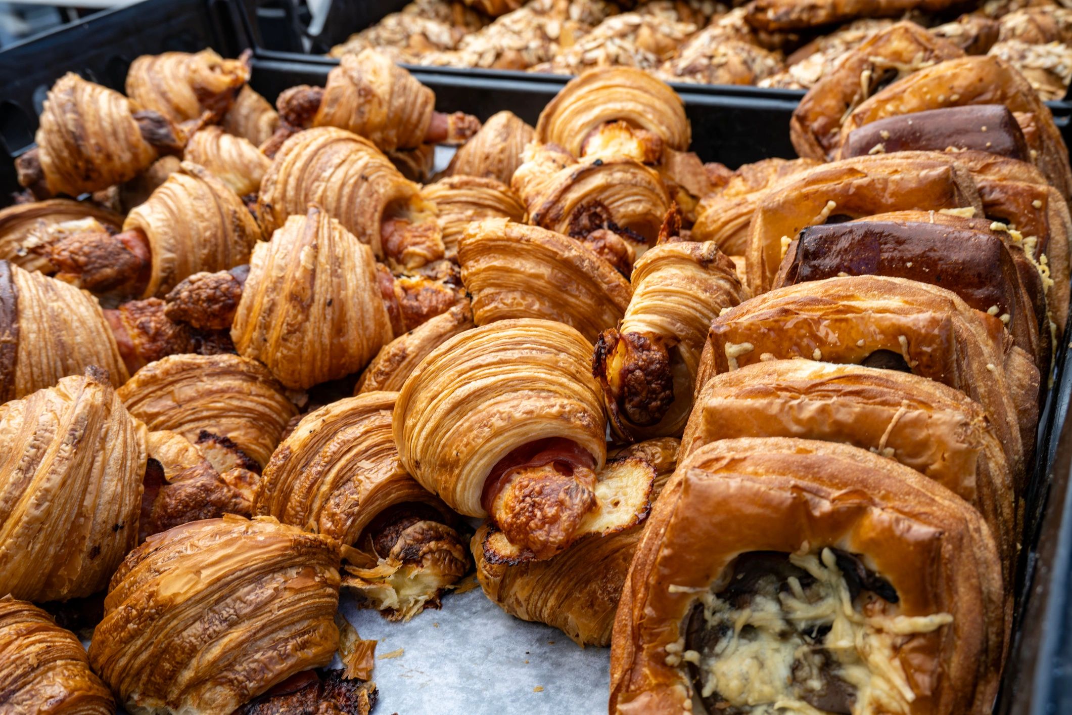 Assorted baked pastries at market