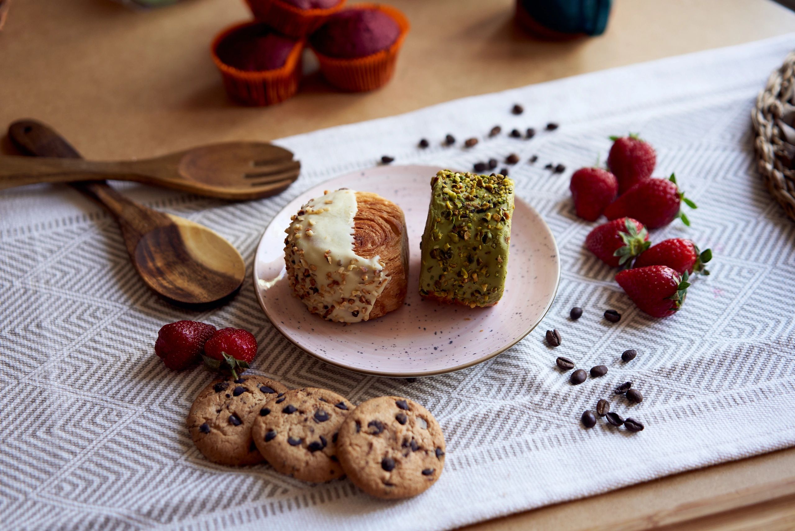 Chocolate and pistachio pastries styled on a plate