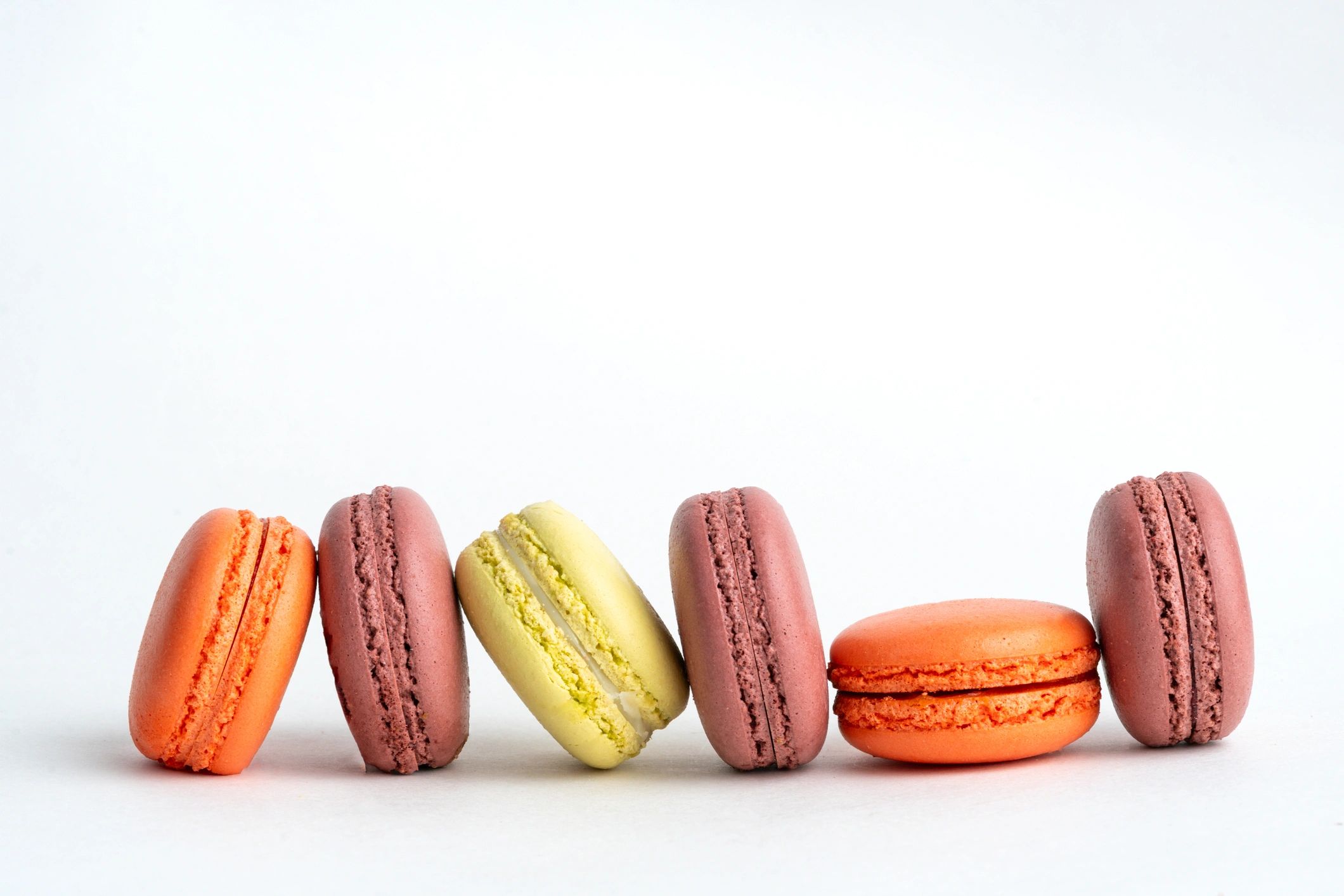 Assorted French macarons studio still life on white background