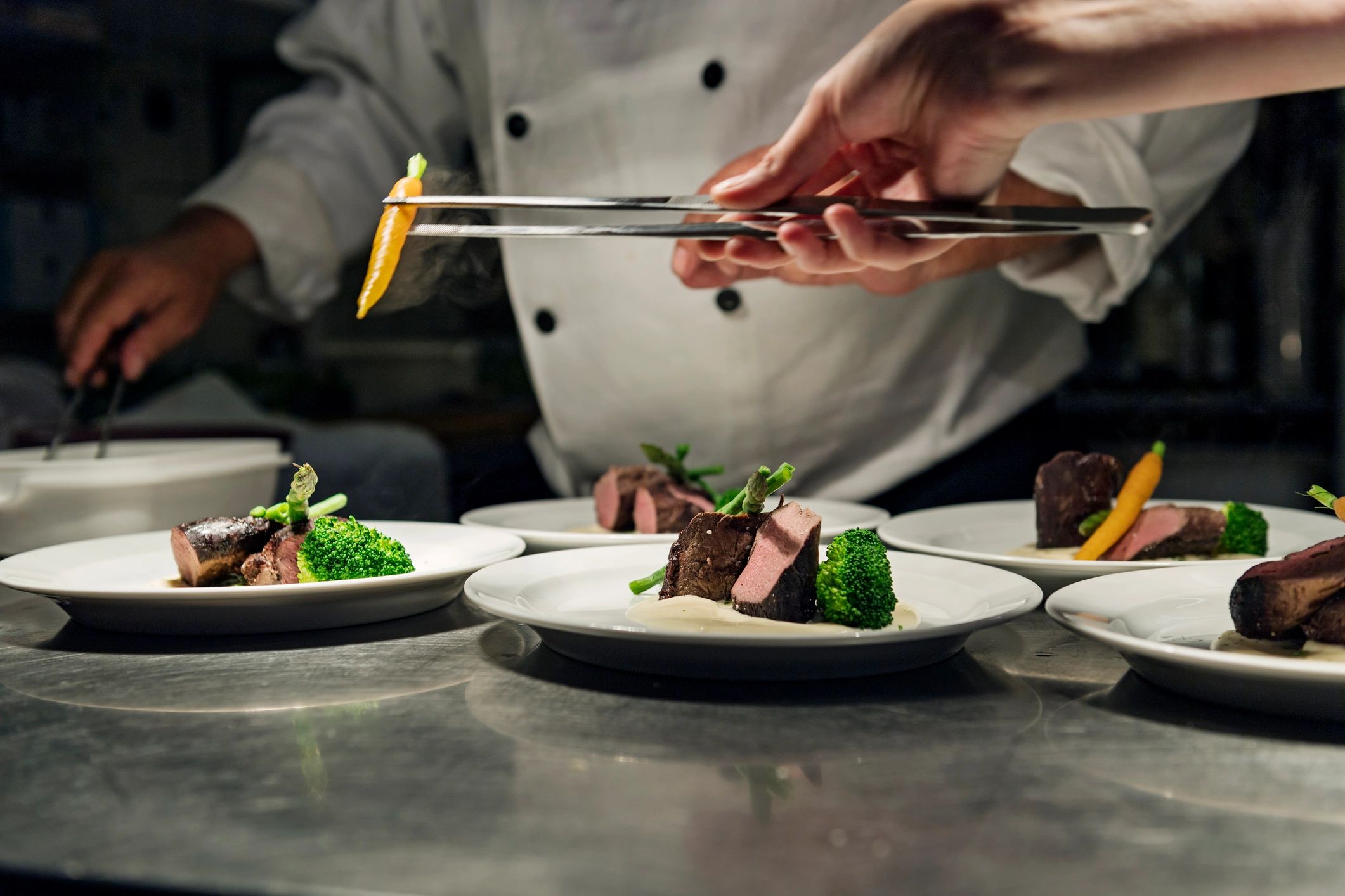 Professional chef team working in a busy kitchen